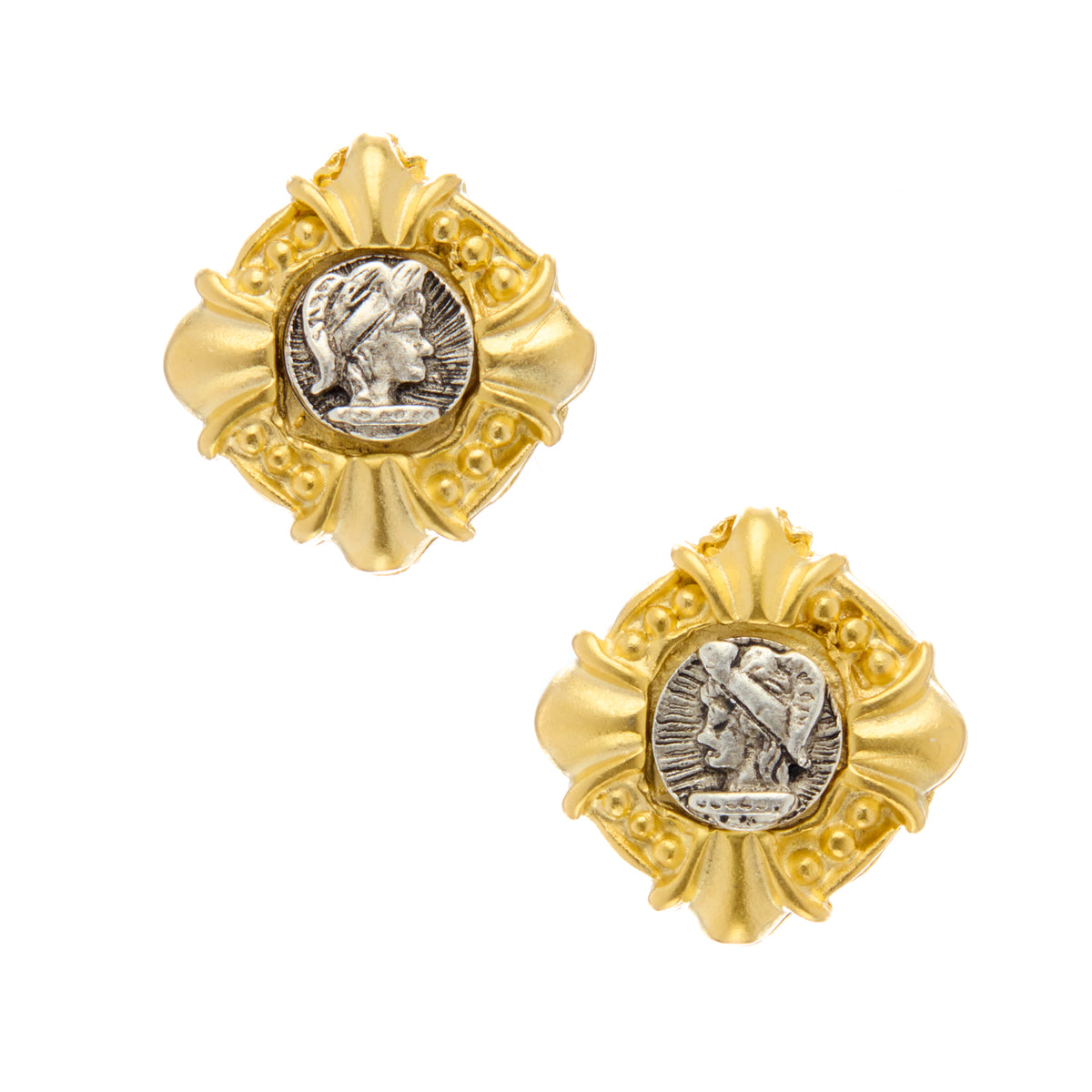 Pair of gold and silver earrings on a white background